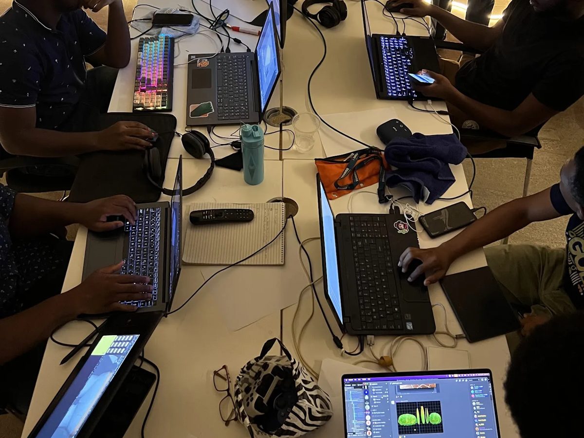 The Creative Leaf crew around one table, laptops everywhere